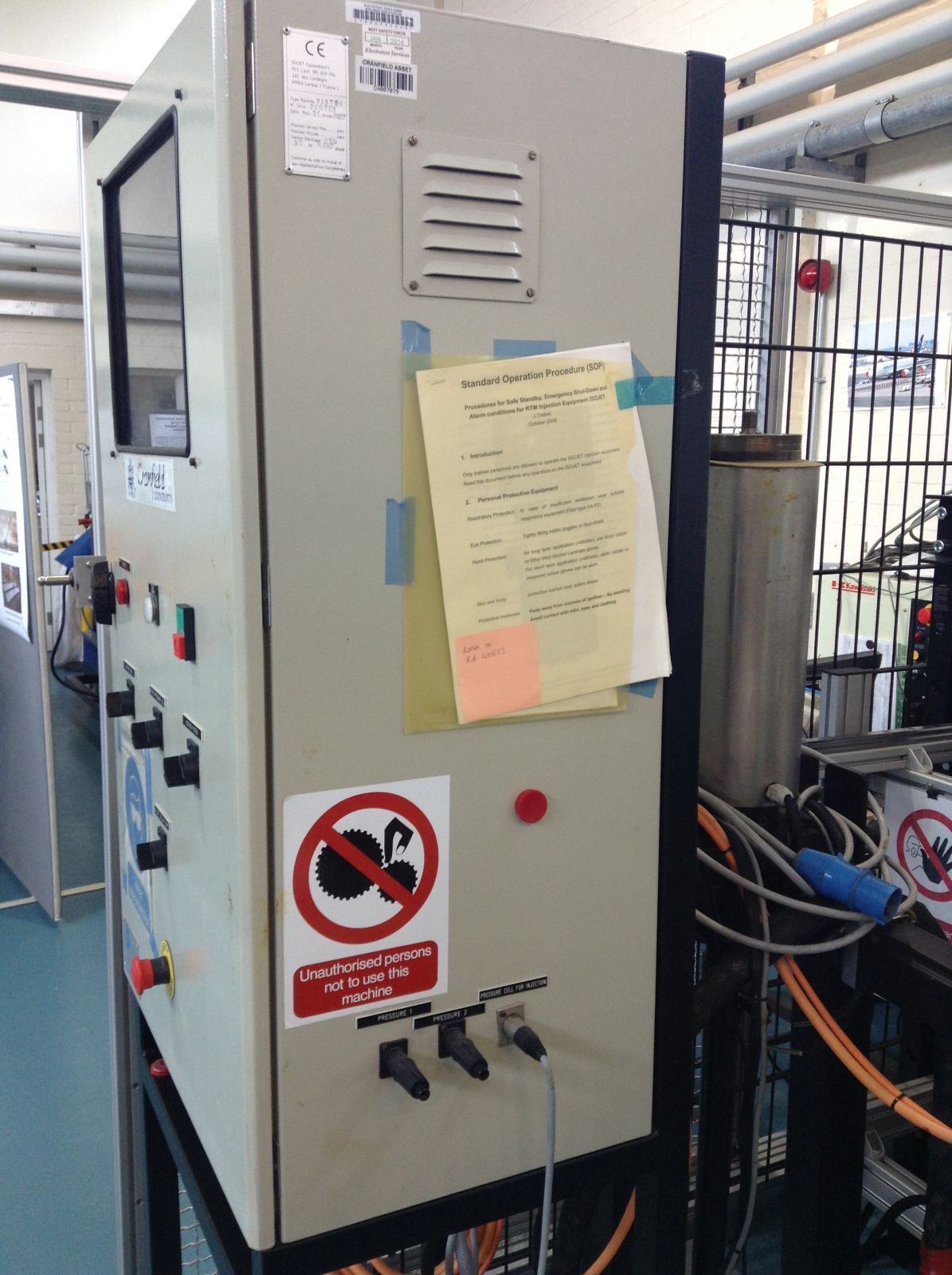 Enhanced composites and structures facility Isojet piston rtm machine