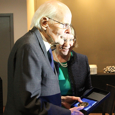 Ralph Hooper with his Distinguished Alumnus Award