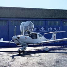 training plane outside hangar