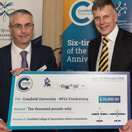 Prof Andy Foster and Sir Peter with £10,000 cheque