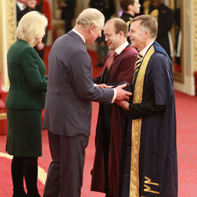 Peter Gregson and Graham Braithwaite collect award from Duke and Duchess of Cornwall