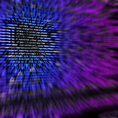 A purple and blue image of computer coding