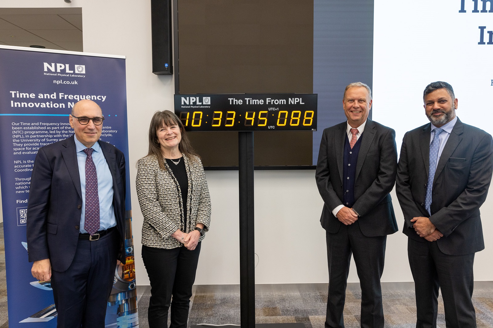 at the innovation node launch a group stand together including Professor Antonios Tsourdos, Professor Dame Karen Holford, Dr Peter Thompson CEO of NPL and Dr Leon Lobo Head of the National Timing Centre