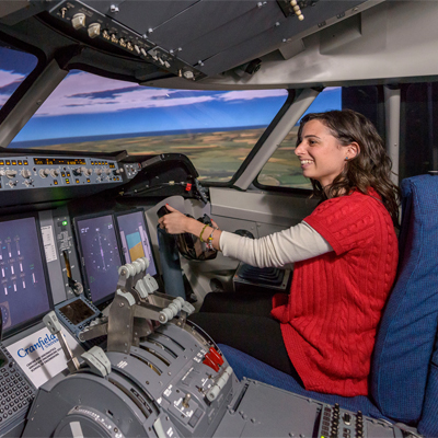 Woman in a flight simulator