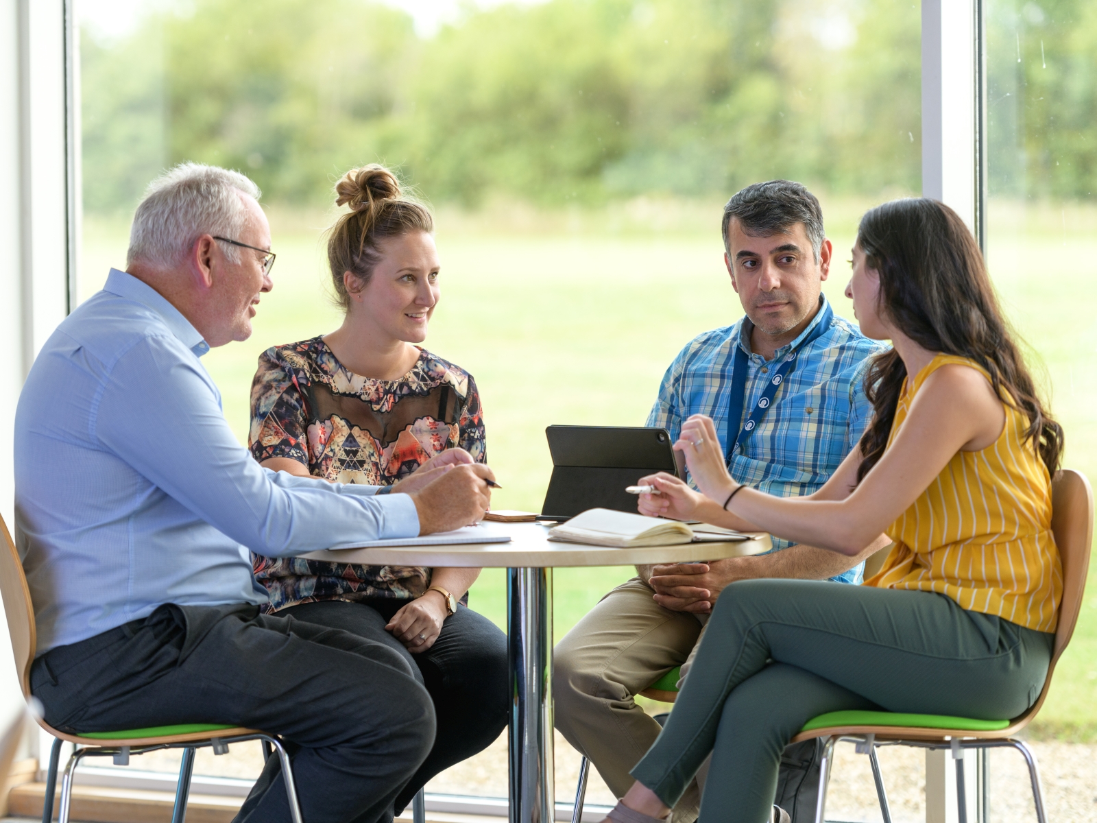 Four people around a table