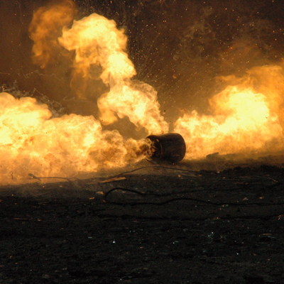 Explosion at night with fire