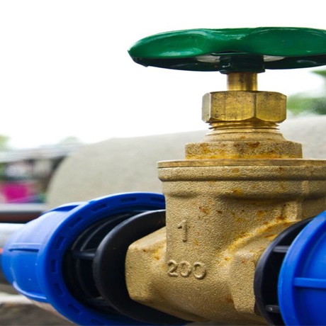 Close up of water valve - green tap