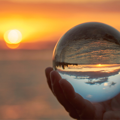 Sunset reflected in a glass ball