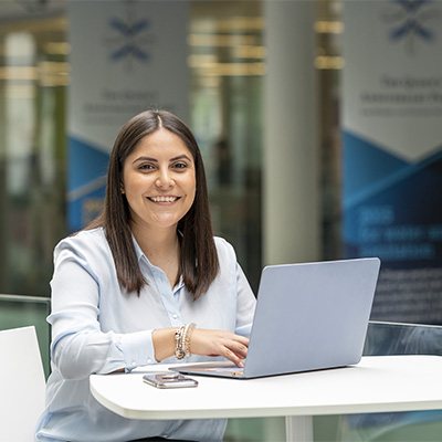 Business People Meeting discussing chart on tablet